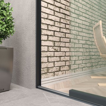 6 railsysteem antraciet met helder glas van 5000 tot 6000 mm breed met totale hoogte van 1970 mm tot 2700 mm