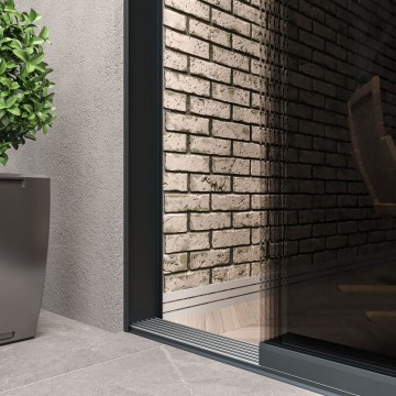 7 railsysteem antraciet met getint glas van 6000 tot 7000 mm breed met totale hoogte van 1970 mm tot 2700 mm